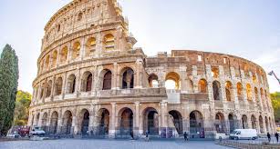 The ancient Roman Colosseum at dawn.