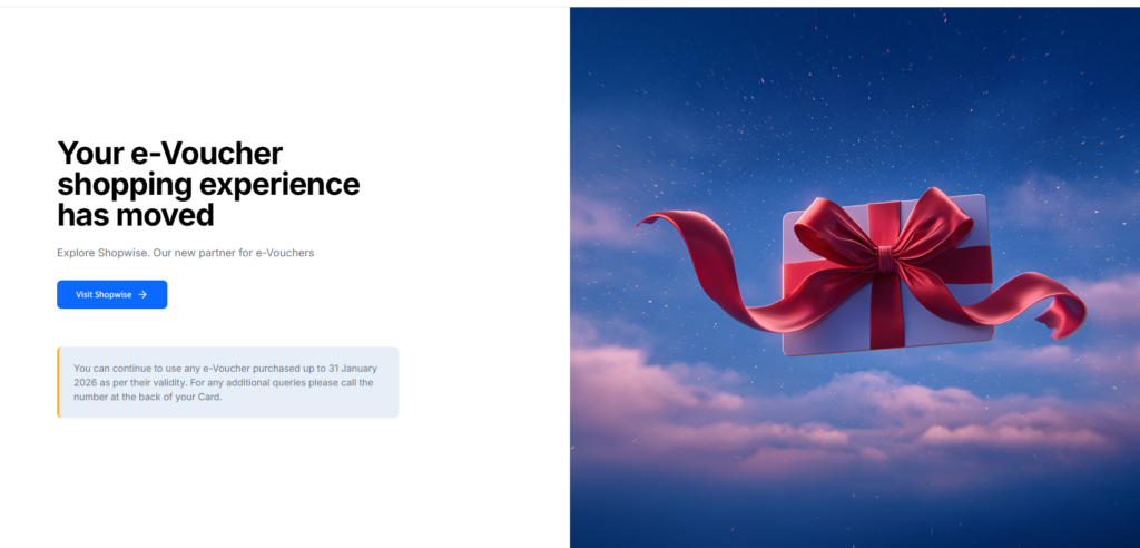 American Express announcement graphic showing a large red gift box with ribbon, text about e-voucher experience moving to ShopWise partner effective February 2026, with "Visit ShopWise" button.