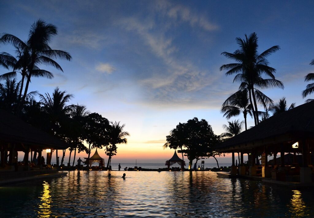 Sunset over the pool at InterContinental Bali Resort, Jimbaran