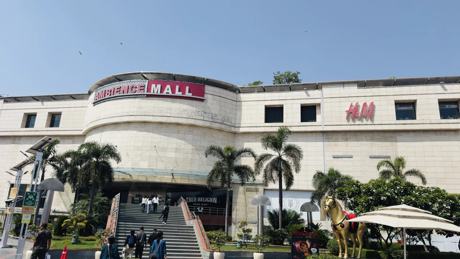Entrance of Ambience Mall in Vasant Kunj, New Delhi, with H&M and True Religion stores