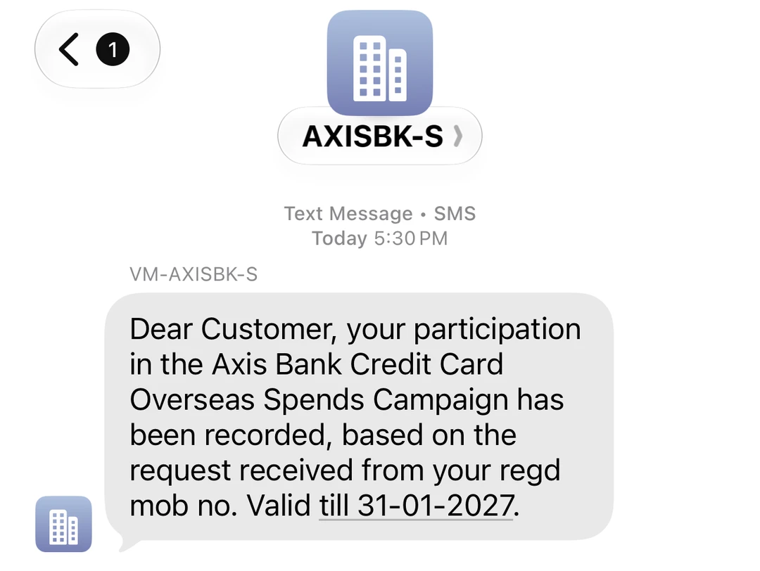Axis Bank SMS confirming participation in the Credit Card Overseas Spends Campaign, valid till 31-01-2027