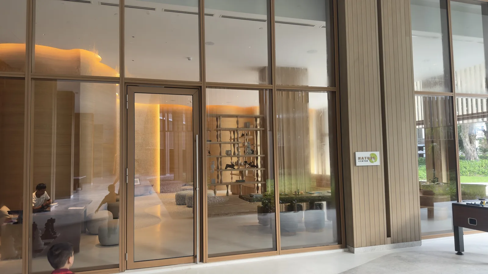 Nature Center kids area at Hilton Burau Bay Langkawi seen through glass doors