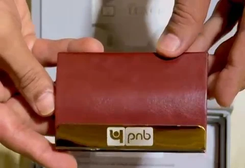 PNB-branded leather card holder from the Luxura welcome kit